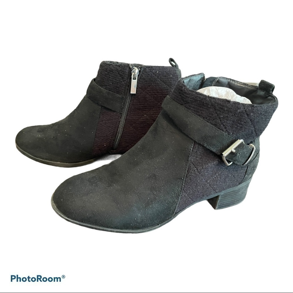 Women’s black ankle boots with buckle accents